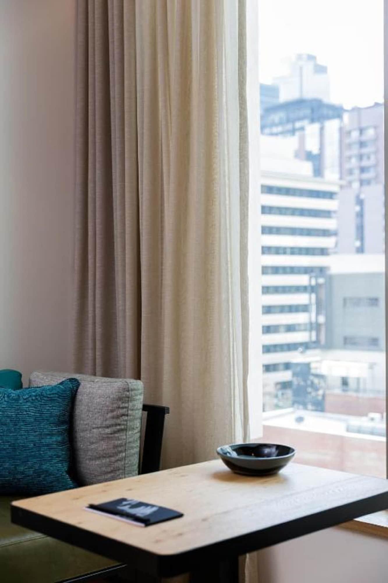 Qt Melbourne Hotel Bagian luar foto A curtain