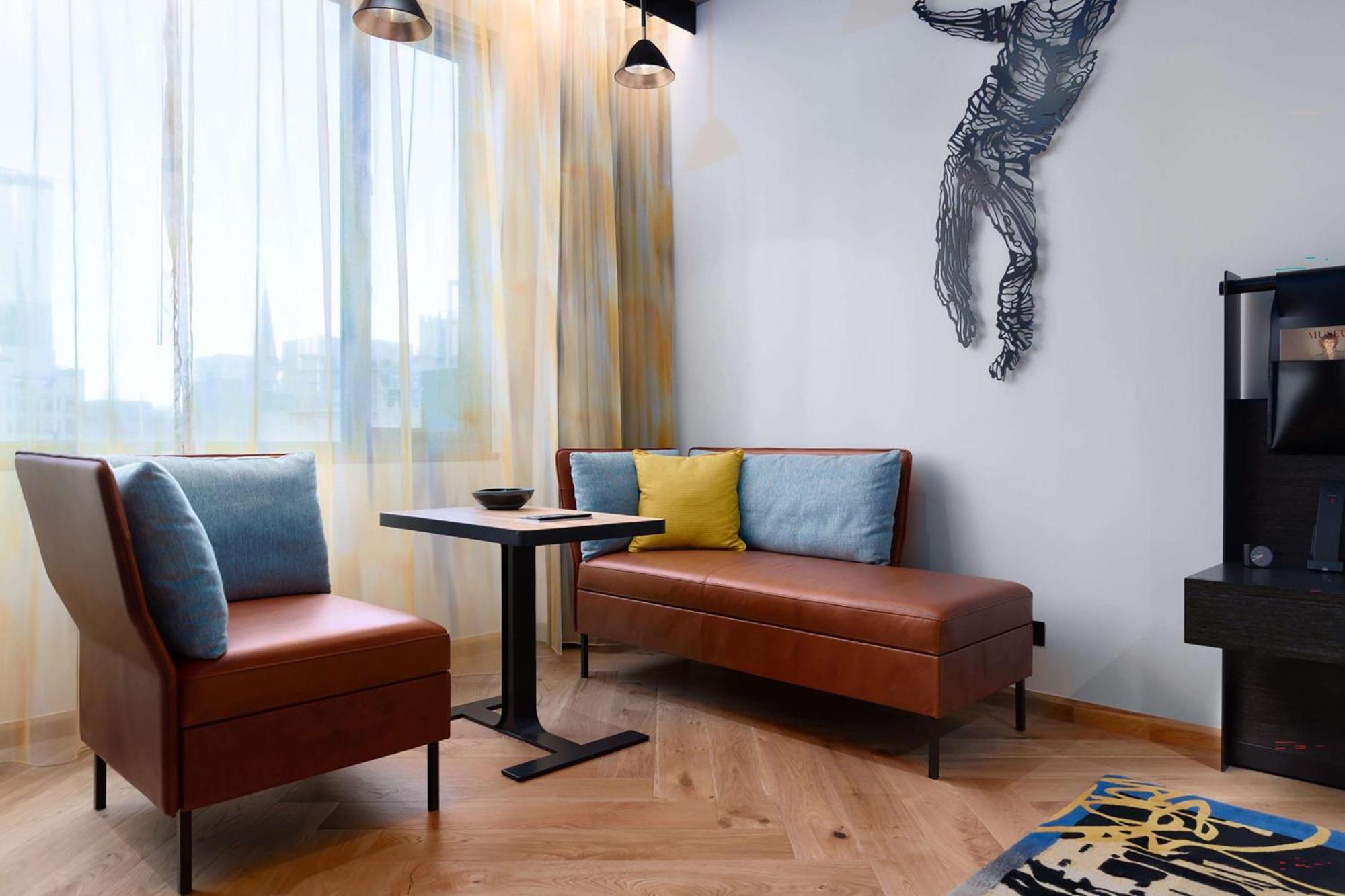 Qt Melbourne Hotel Bagian luar foto A living room in a serviced apartment in Beijing, China