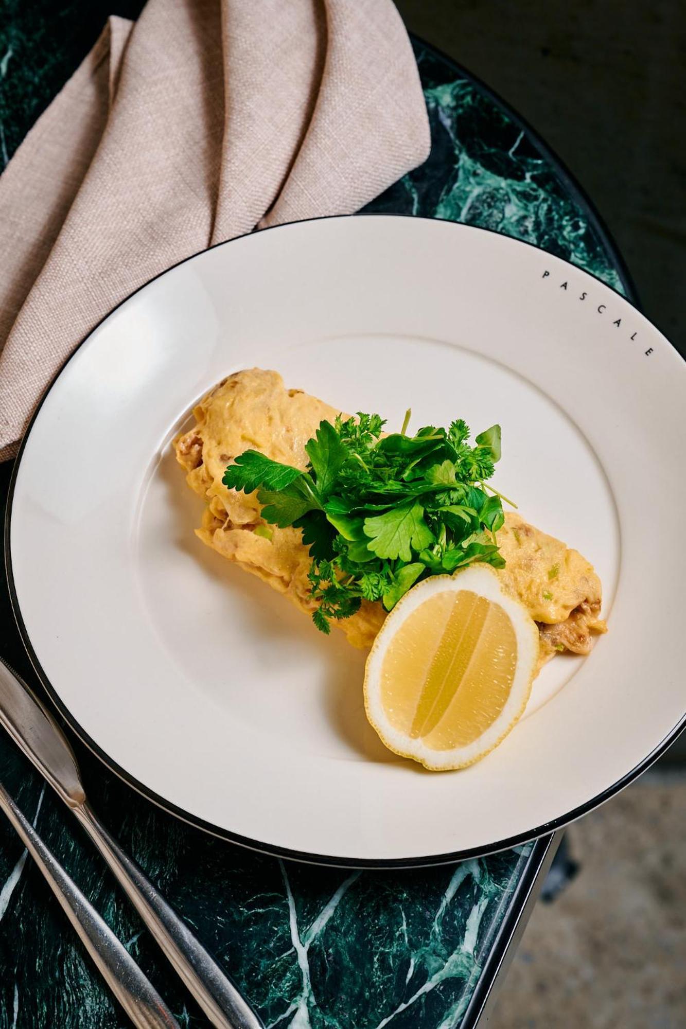 Qt Melbourne Hotel Bagian luar foto A prepared omelette